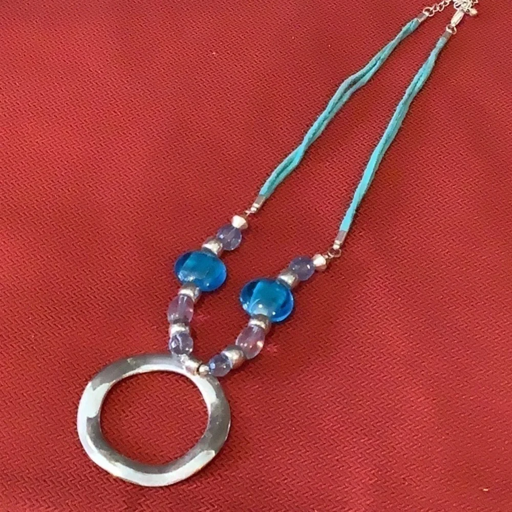 Statement necklace blue leather with blue glass beads silver metal pendant